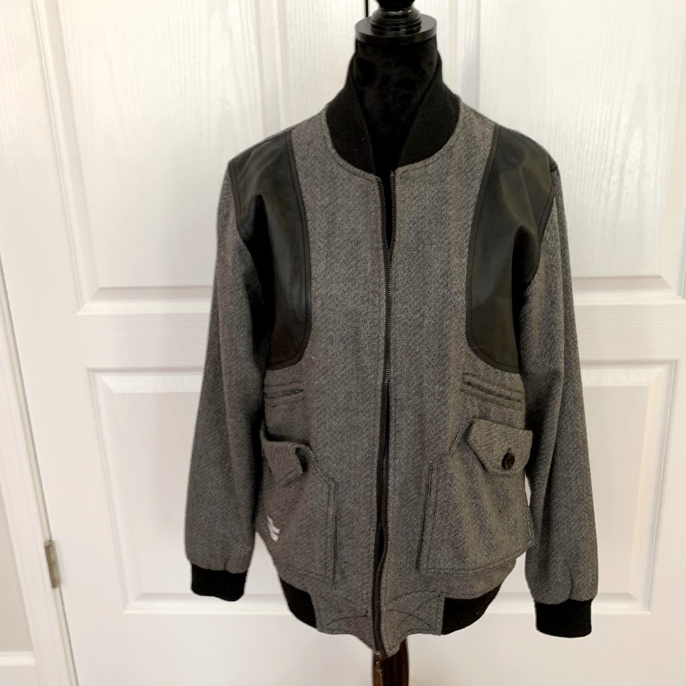 PUBLISH tweed bomber jacket with black faux leather inserts on front of jacket.